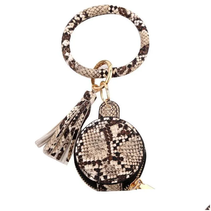 stock colorful pu leather tassels bracelets keychain wristlet sunflower leopard earphone bags makeup bag with mirror keyring heads