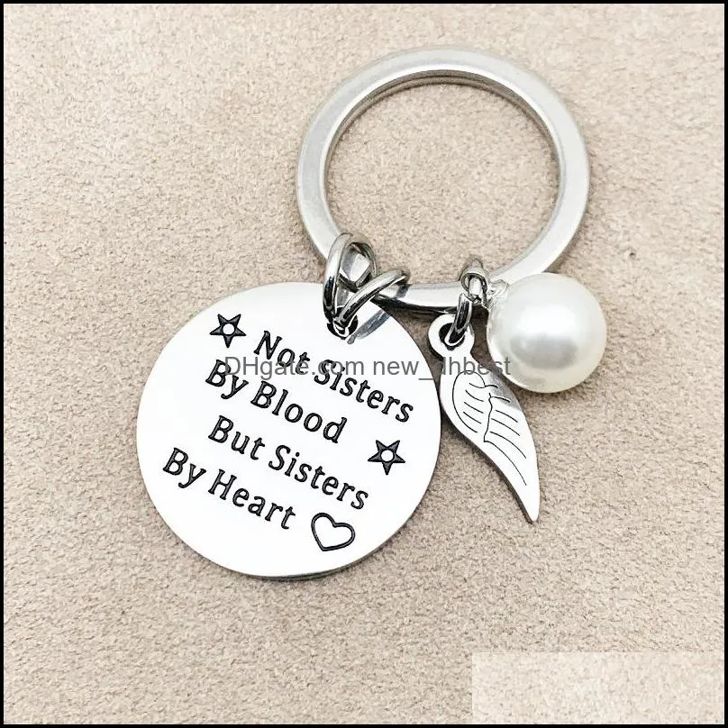 sister stainless steel keychain wings heart round shape pendant engrave words not sisters by blood but sisters by heart key ring for