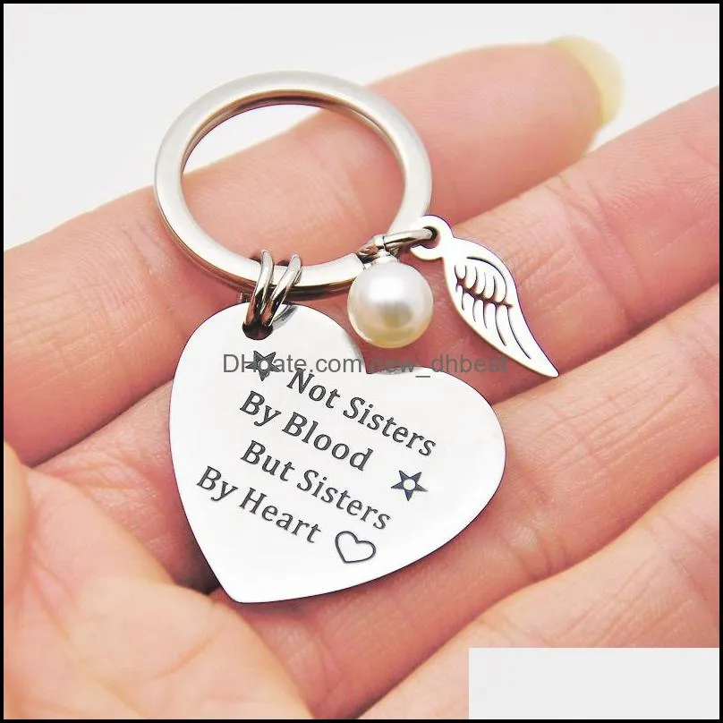 sister stainless steel keychain wings heart round shape pendant engrave words not sisters by blood but sisters by heart key ring for