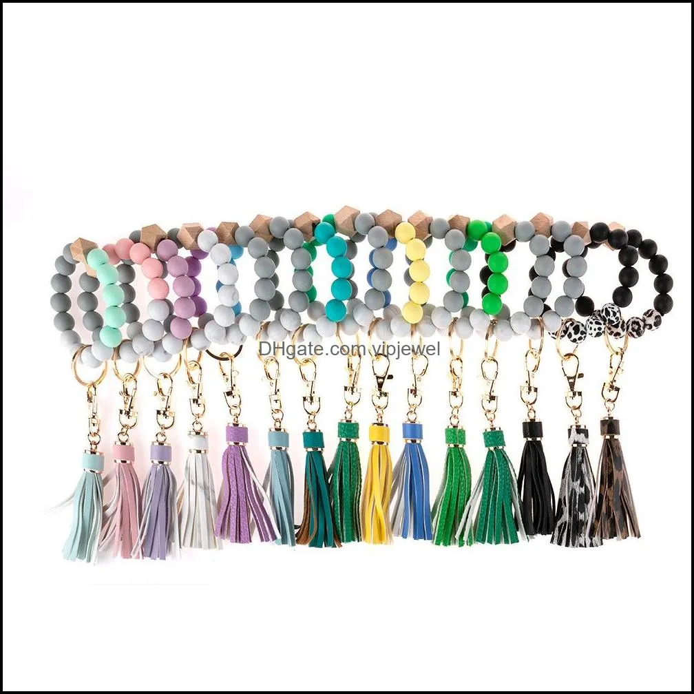 wooden beads wristlet key ring solid color stretchy silicone bracelet keychain with tassel for lady bag pendant q385fz