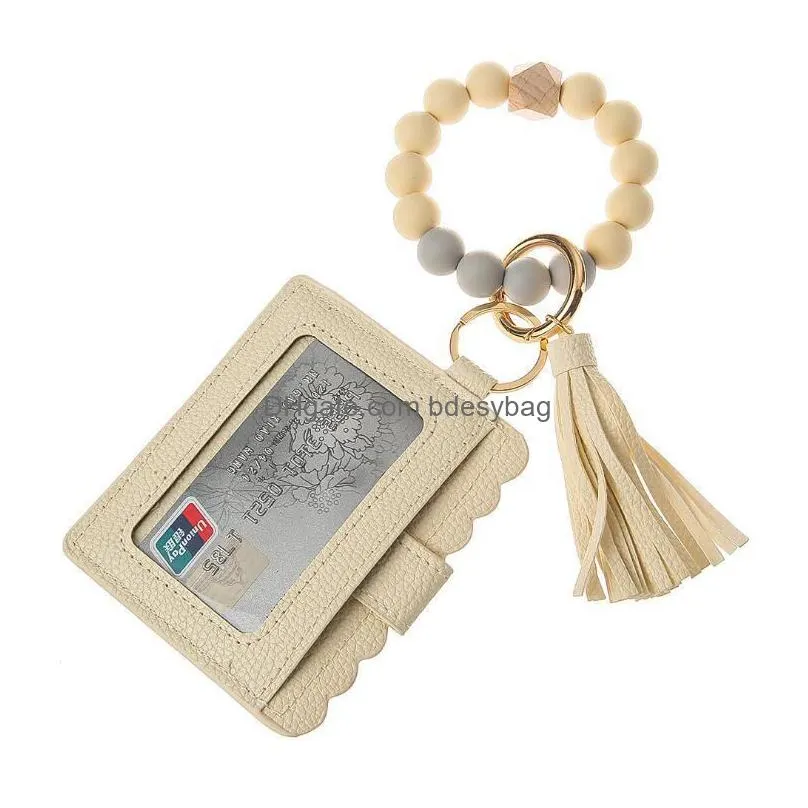 party favor us stock fashion pu leather bracelet wallet keychain party favor tassels bangle key ring holder card bag silicone beaded wristlet