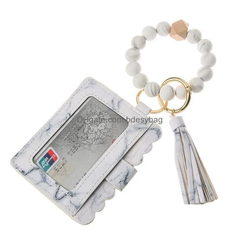 party favor us stock fashion pu leather bracelet wallet keychain party favor tassels bangle key ring holder card bag silicone beaded wristlet