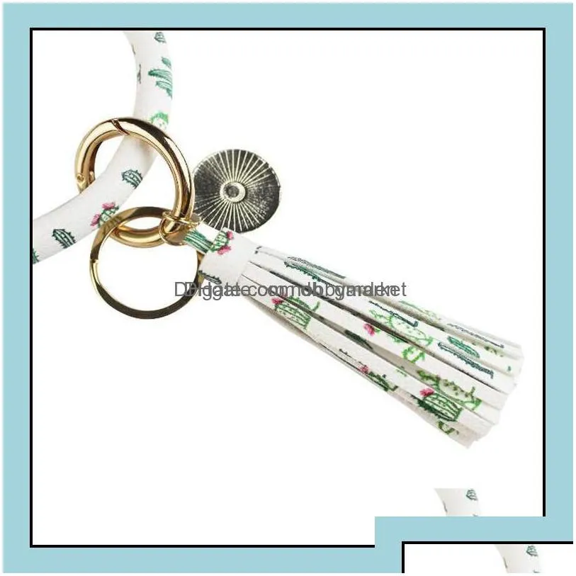 key rings jewelry 26 color pu leather bracelets keyring round drop oil tassel pendant bracelet bangle keychain for women girl wrist