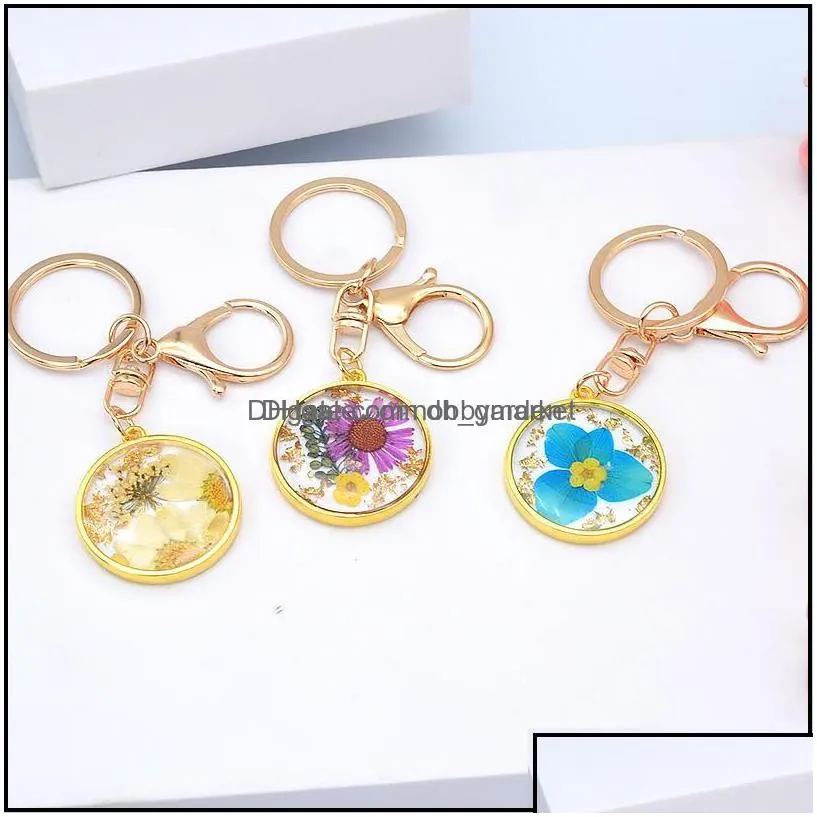 key rings jewelry cute daisy flower keychains epoxy resin round pendant keyring holder women girls car chains charm bag gifts drop