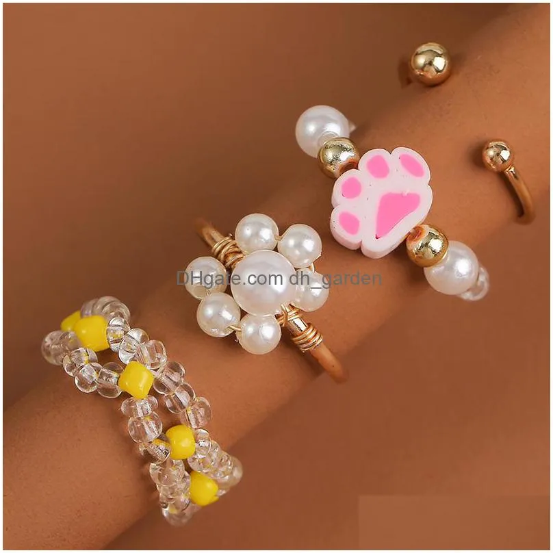 4 pcs/set boho womens transparent yellow glass handmade beaded white pearl weave flower polymer clay cat paw rings set jewelry