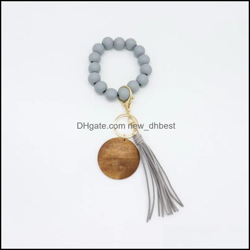 elastic force bracelet key ring round wood beaded tassels keybuckle solid color simple jewelry