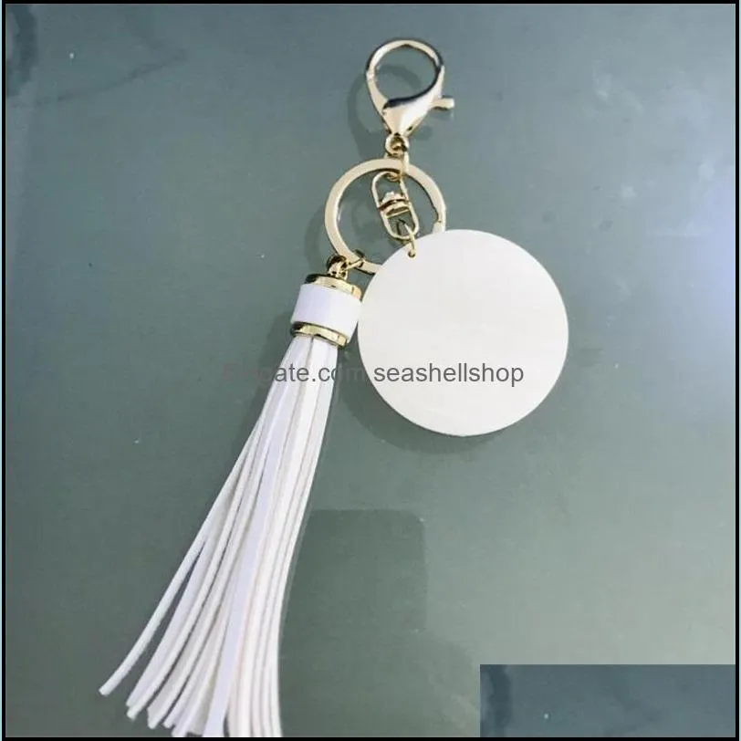 2022 the factory wholesale personalized blank pu leather tassel wood key chain tassle key chain for women high quality 290c3