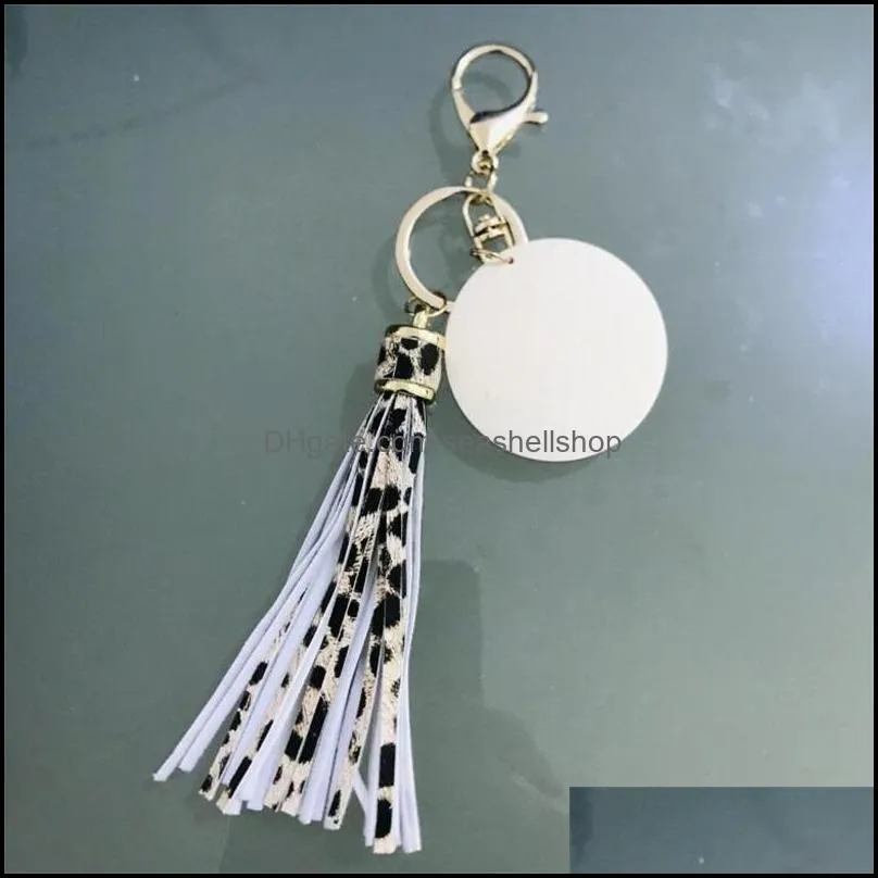 2022 the factory wholesale personalized blank pu leather tassel wood key chain tassle key chain for women high quality 290c3