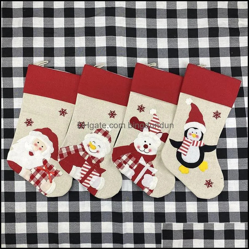 4 styles 47x22cm christmas stocking nonwoven fabric old man snowman elk penguin creative santa xmas stockings gift bag candy paf11666