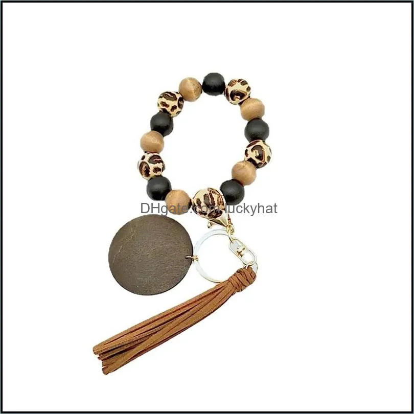 kimter leopard wood beads bracelet key ring with tassel circle fashion elastic keychains for lady handbag pendant jewelry 2184 q2