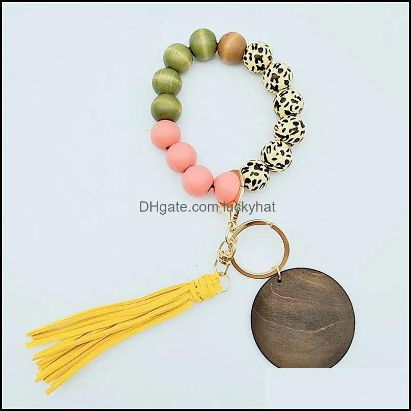 kimter leopard wood beads bracelet key ring with tassel circle fashion elastic keychains for lady handbag pendant jewelry 2184 q2