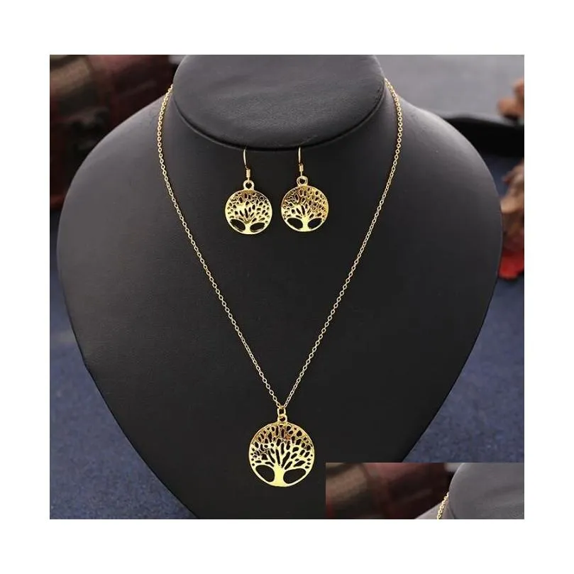  s fashion women hollowing tree life disk pendant necklace and earrings jewelry set plated golden silvery