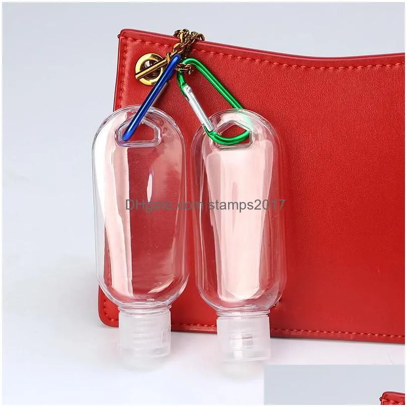 wholesale 50ml empty alcohol refillable bottle with key ring hook clear transparent plastic hand sanitizer for travel bottles