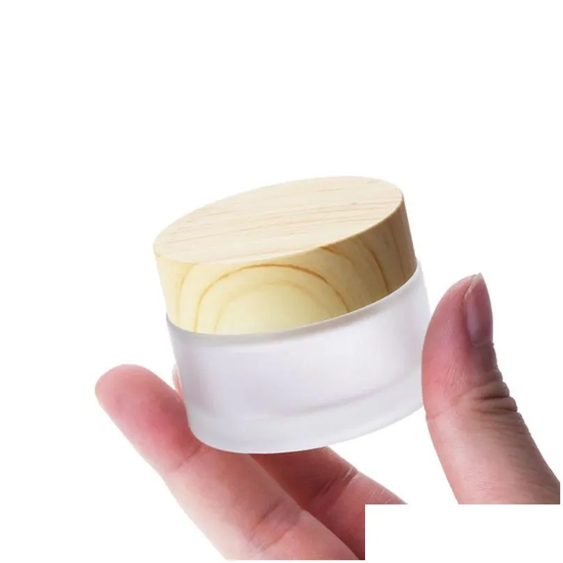 wholesale Frosted Glass Jar Cream Bottles Round Cosmetic Jars Hand Face Packing Bottle 5g 50g Jares With Wood Grain Cover