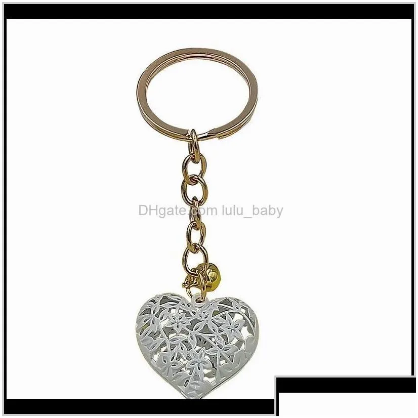 Aessories20Pcs/Lot Wholesale Hollow Heart Fashion Charm Cute Purse Bag Pendant Car Keyring Chain Ornaments Gift Keychains T200804 655 Drop