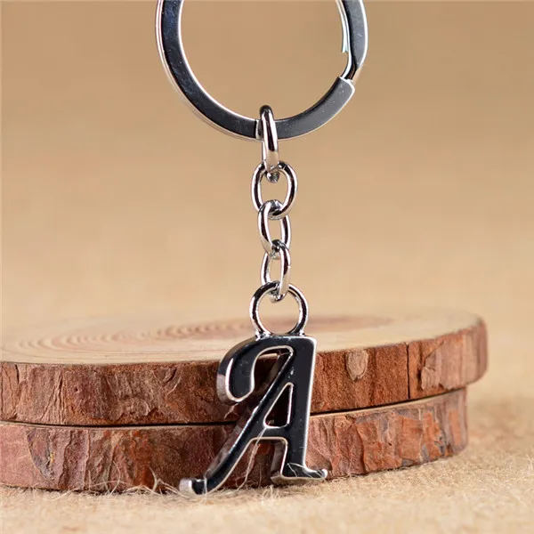 hot diy letters a z metal key chain rhodium plated unisex keychain simple letter name car key ring for best party gift
