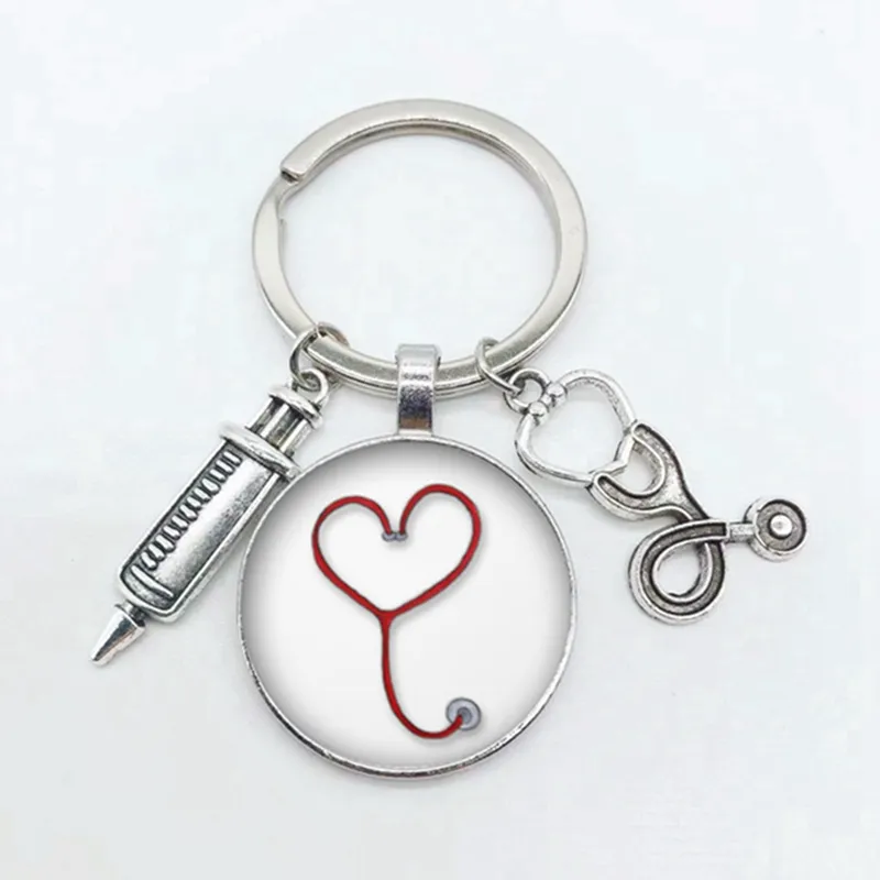 creative doctor injection stethoscope picture keychain round dome pendant men and women fashion stethoscope syringe alloy key ri key chains