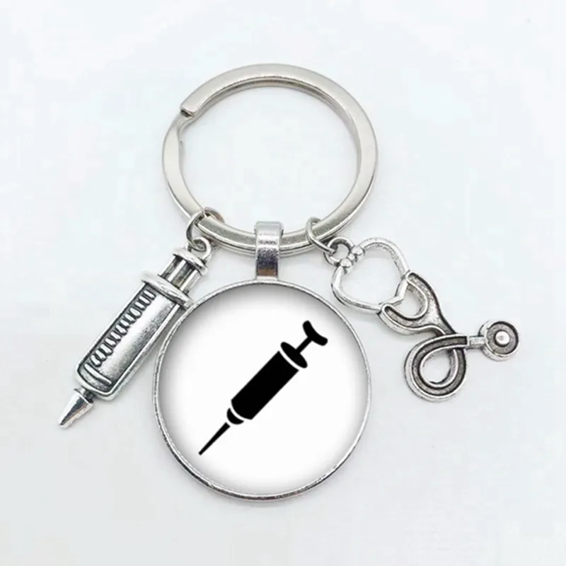 creative doctor injection stethoscope picture keychain round dome pendant men and women fashion stethoscope syringe alloy key ri key chains