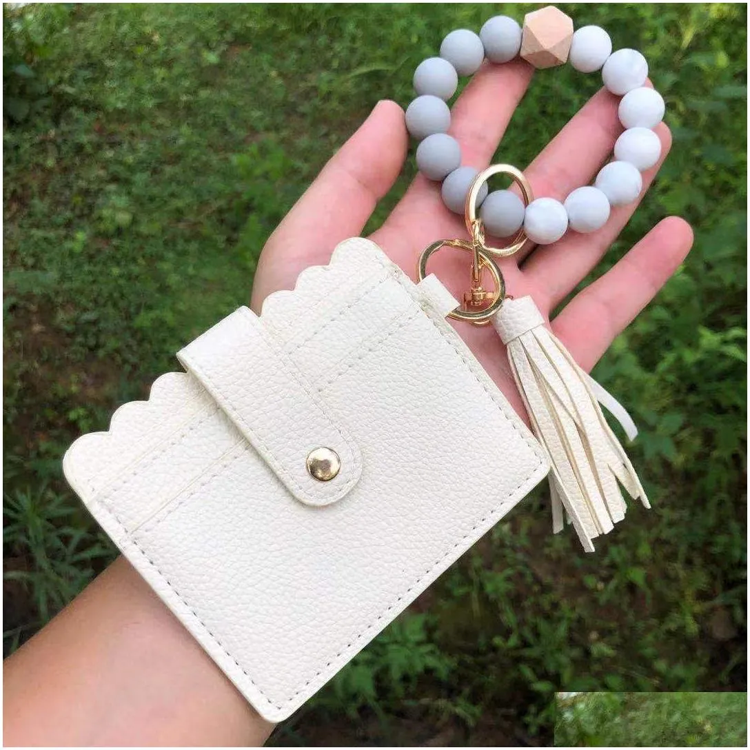 7 styles leopard silicone bead bracelet keychain id card bag sunflower solid colors pu leather wallet wrist bags with tassels