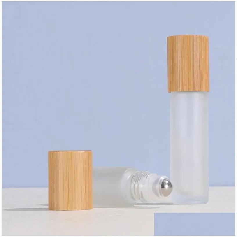 wholesale 10ml glass  oil bottles clear amber roll on oils bottle bamboo lid stainless steel roller ball