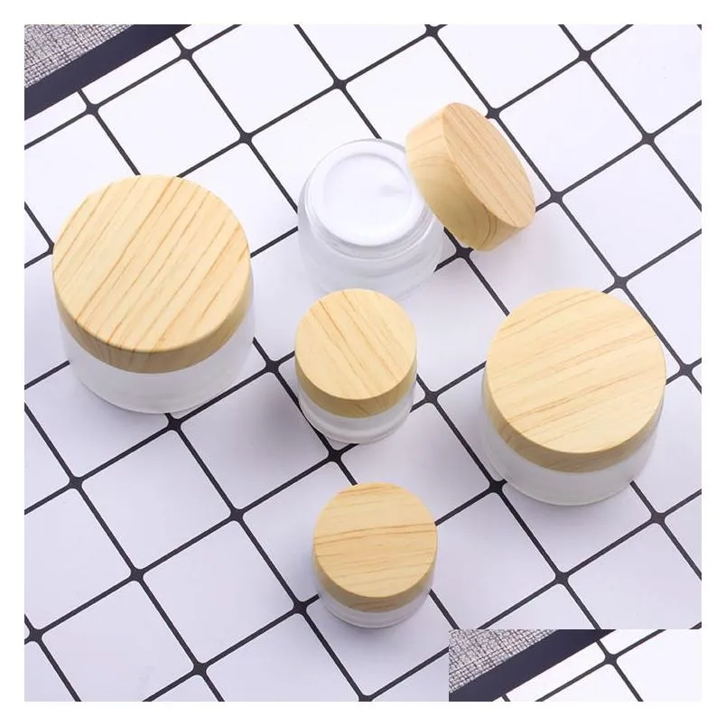 wholesale frosted glass jar cream bottles round cosmetic jars hand face packing bottle 5g 10g 15g 30g 50g with wood cover