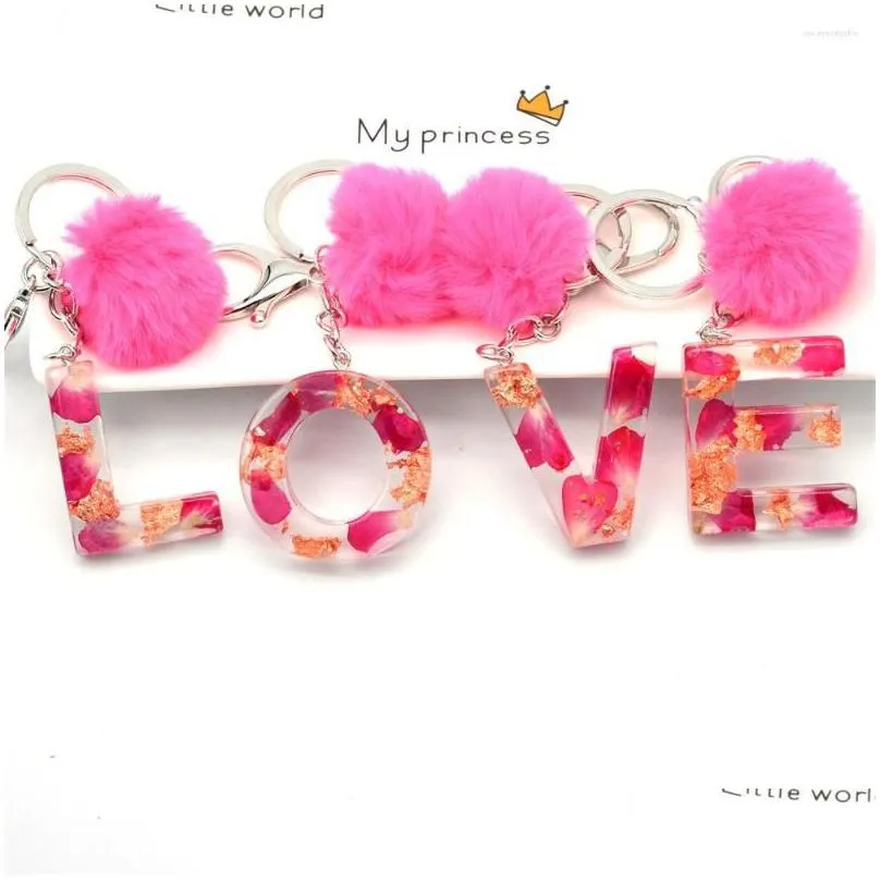 keychains red rose petal gold foil filling 26 letters keychain with pink pompom key ring exquisite resin holder women bag ornaments