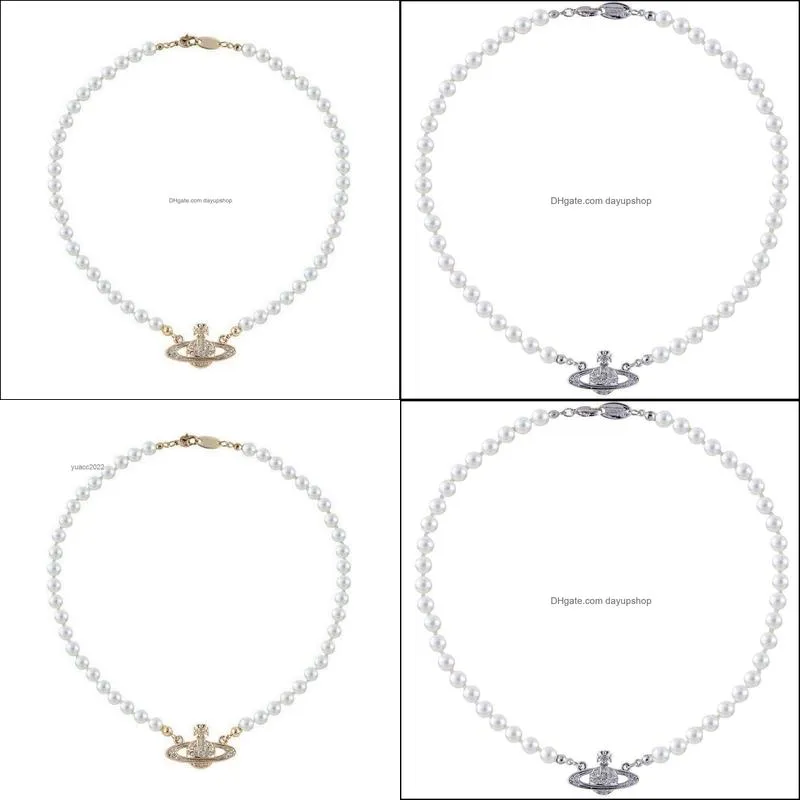 Pendant Necklaces The queen mother of the West has a necklace full of diamonds a collarbone chain and a Saturn Pendant Necklace Set with diamonds for