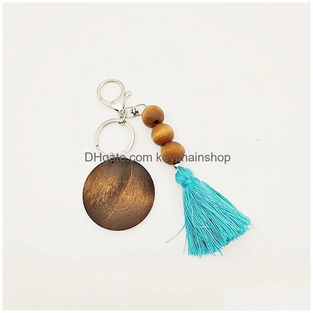 party favor wooden bead keychain with round wood chips and cotton tassel pendant key ring custom sublimation logo