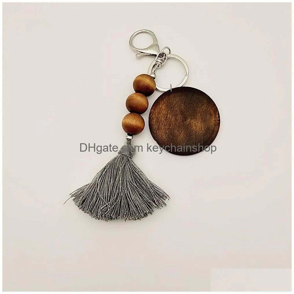 party favor wooden bead keychain with round wood chips and cotton tassel pendant key ring custom sublimation logo