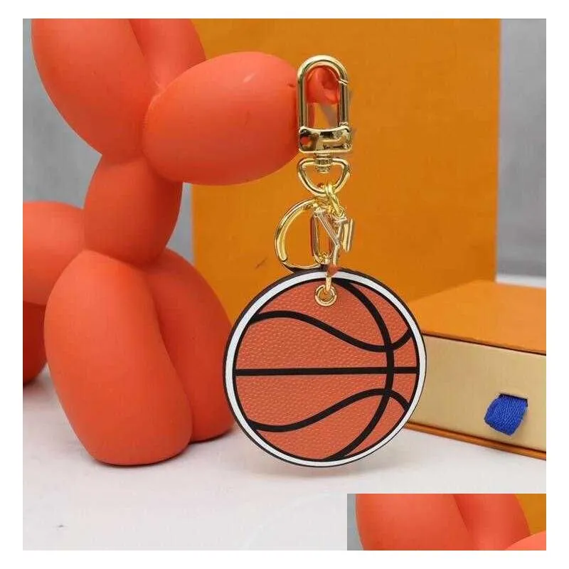 designer fashion keychain letter printing round high quality basketball key chain uni pu leather alphabet pattern car keys ring