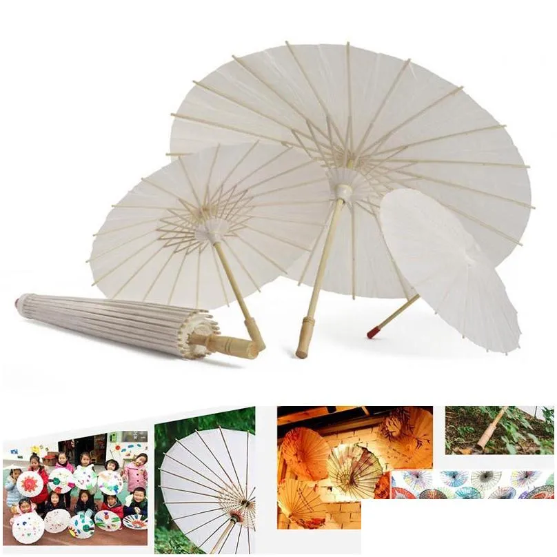 white paper umbrella photographs art display parasol accessory wedding bride decor home decoration