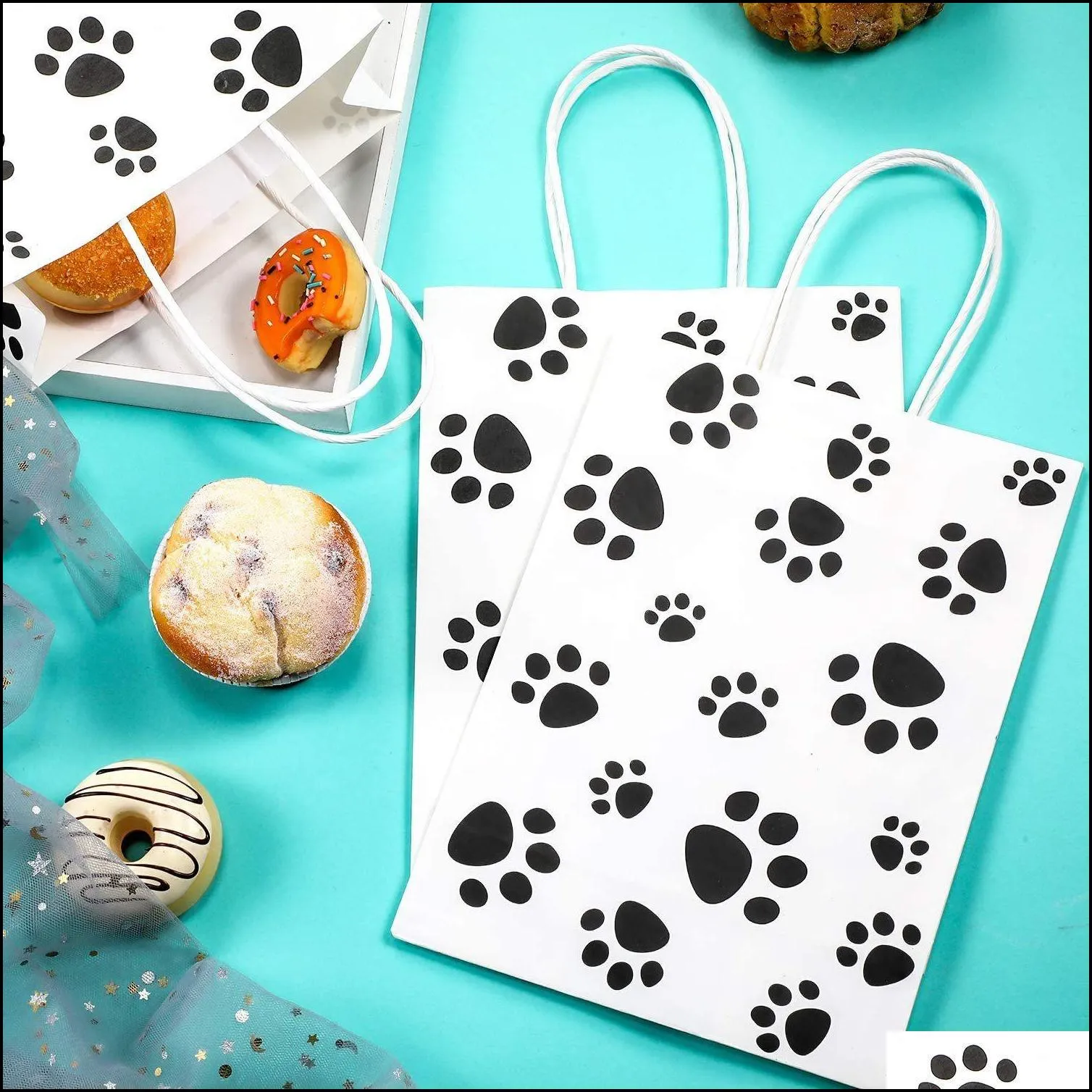 puppy dog paw print treat bags with paper twist handles for pet party favor