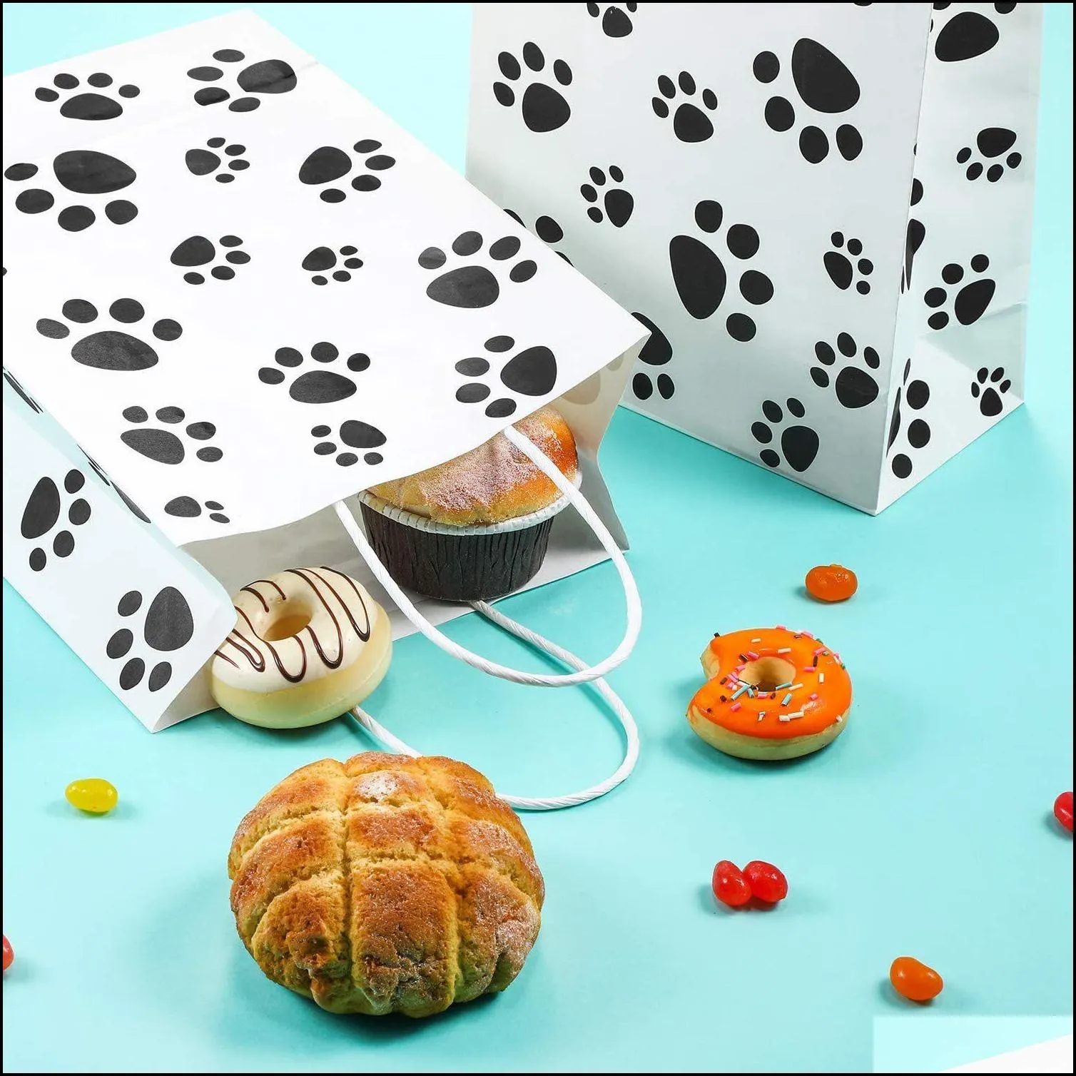 puppy dog paw print treat bags with paper twist handles for pet party favor