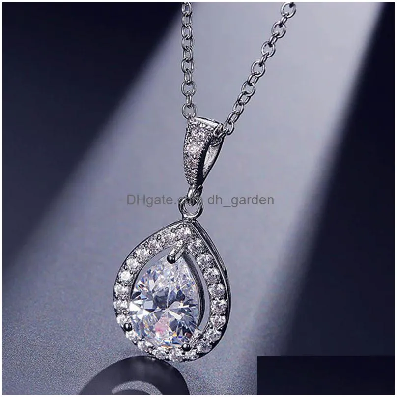 cubic zircon bridal necklace pendant with pave frame halo and bold pearshaped teardrop necklace for women wedding anniversary