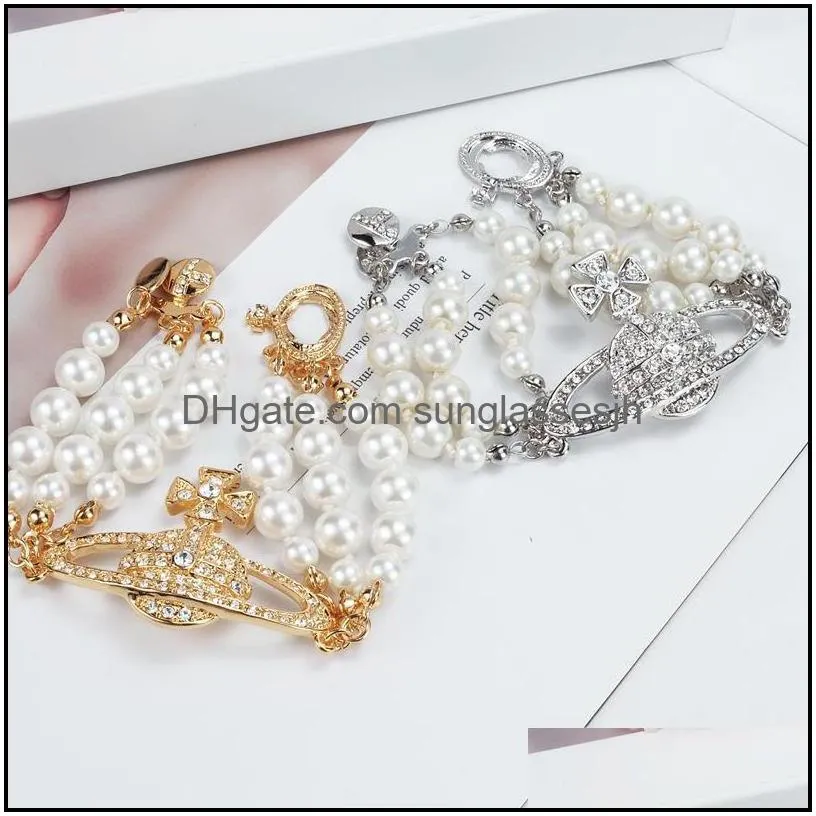 luxurious western queen threetiered white pearl necklace bracelets full diamond saturn retro planet pendant punk style designer jewelry sets womenns