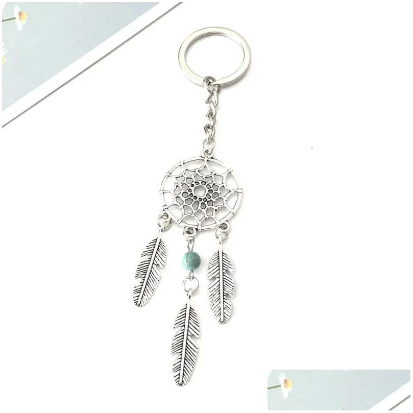 new fashion catch the dream car key chain feather metal keychain men women key holder valentine s gift car key rings 920 q2