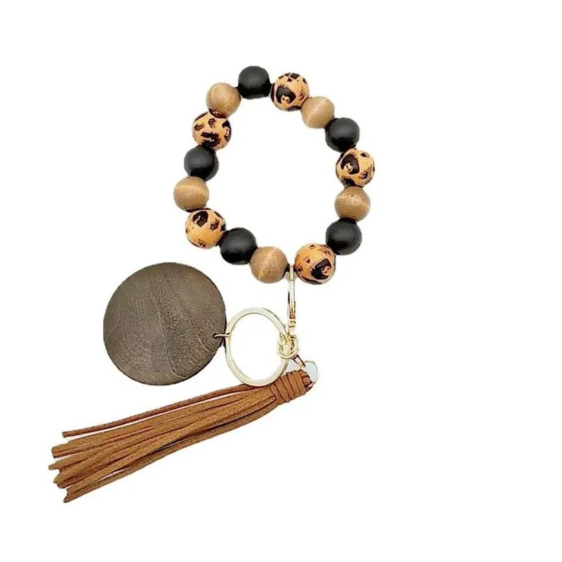 kimter leopard wood beads bracelet key ring with tassel circle fashion elastic keychains for lady handbag pendant jewelry 2184 q2