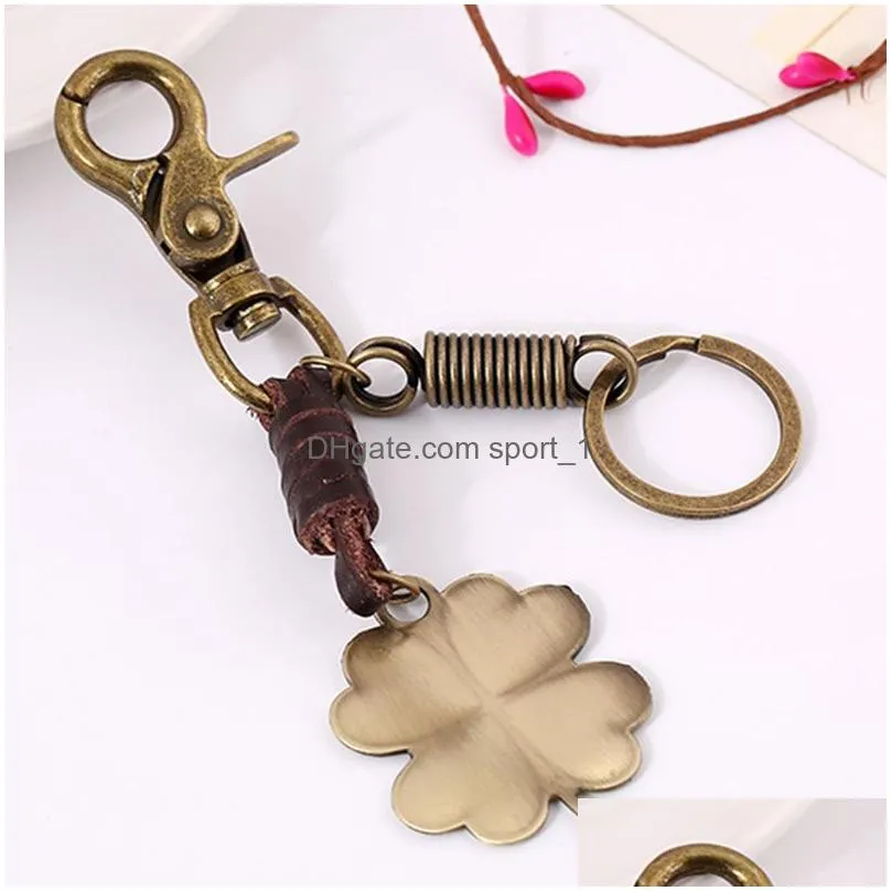 vintage leather keychain creative four leaf clover whistle alloy key chain pendant luggage decoration keyring
