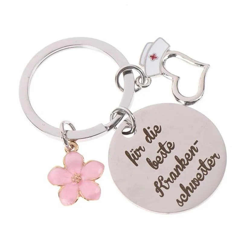 stainless steel nurse keychains pendant creative flower shaped round brand keychain luggage decoration key ring nurses day gift