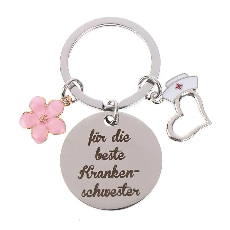 stainless steel nurse keychains pendant creative flower shaped round brand keychain luggage decoration key ring nurses day gift