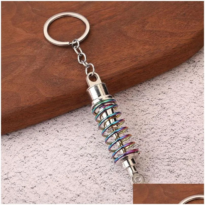 creative shock absorber keychain metal car keychain pendant luggage decoration keyring key chain