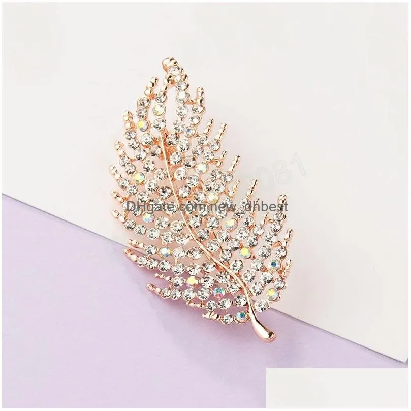 fashion crystal feather brooch zinc alloy exquisite gold color feather lapel pins dress coat accessories party wedding jewelry