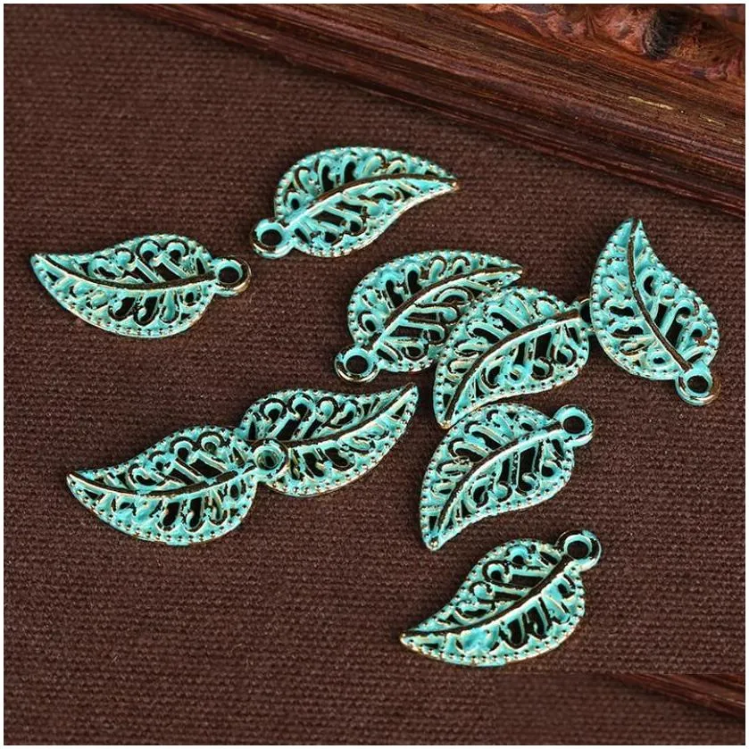 epacket dhs vintage tibetan silver hollow leaf small charms pendant accessories gsxd009 jewelry charm pendants