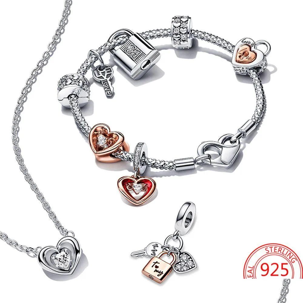 the s925 sterling silver two color key sliding heart suspension charm is suitable for pandora bracelet necklace necklace girl valentines jewelry