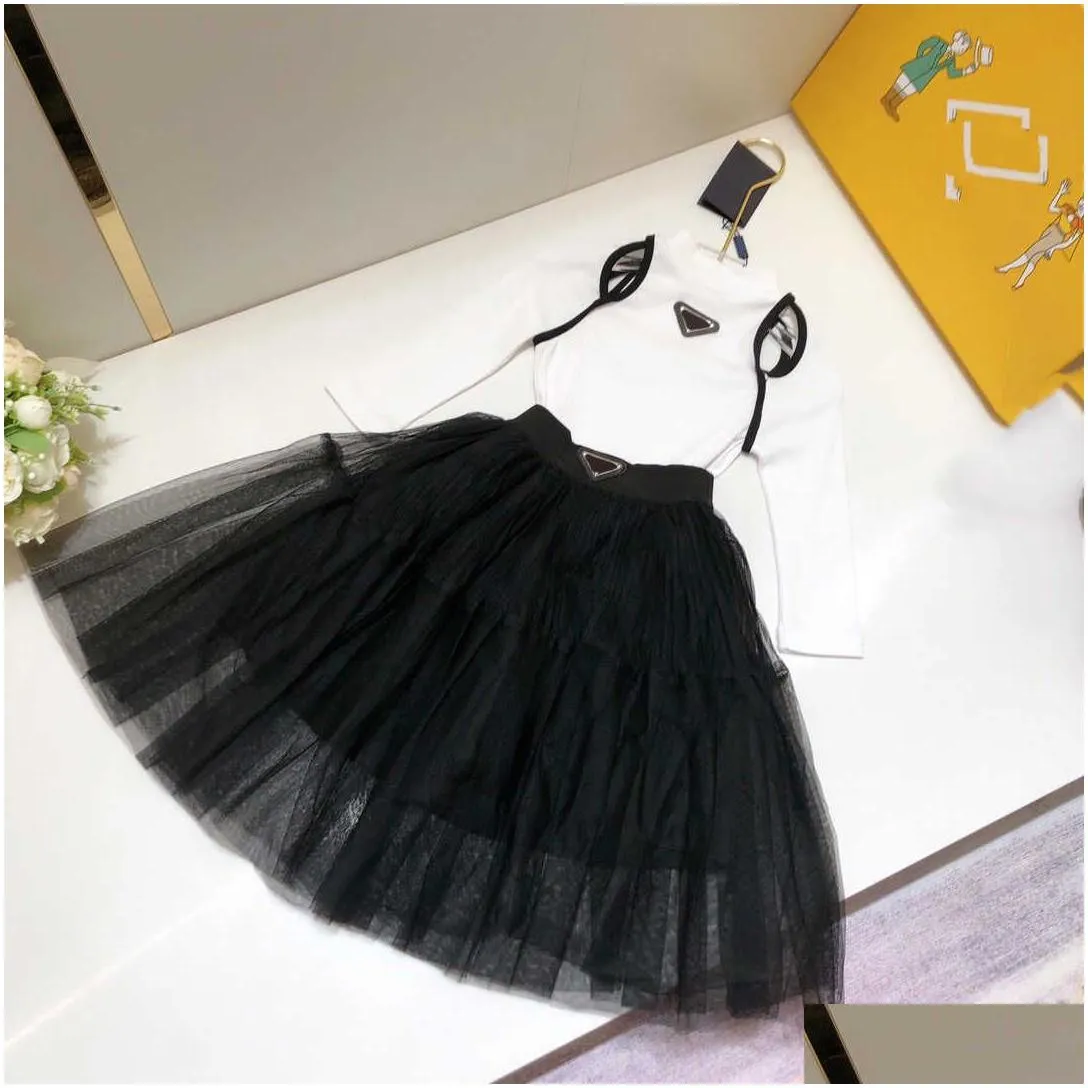 23ss designer brand kids T-shirt skirt suit girls knitting Bare shoulder High collar Short sleeve Net yarn pleated skirt set High quality kids clothing