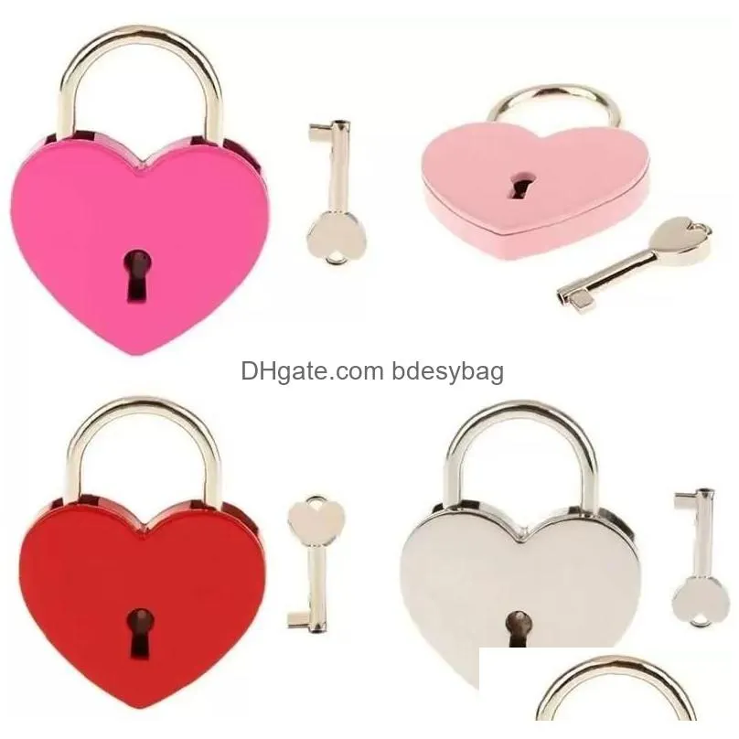 Party Favor Valentines Day Party Gifts 7 Colors Heart Shaped Concentric Lock Metal Mitcolor Key Padlock Gym Toolkit Package Door Locks Dh6Aq