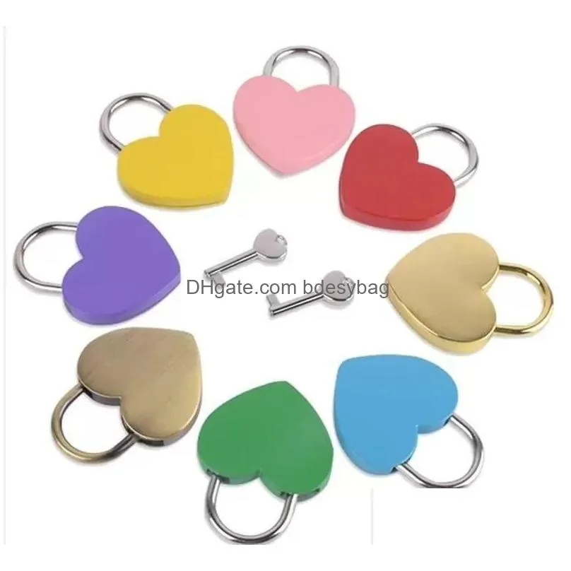 Party Favor Valentines Day Party Gifts 7 Colors Heart Shaped Concentric Lock Metal Mitcolor Key Padlock Gym Toolkit Package Door Locks Dh6Aq