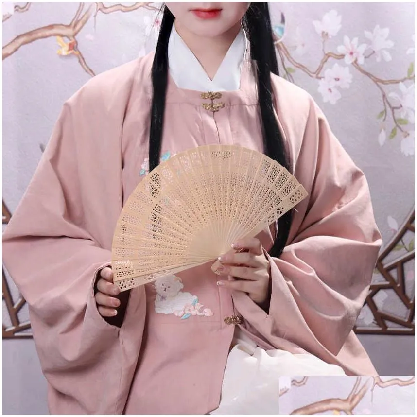 Chinese Style Products Chinese Style Products Hollow Folding Fan Sandalwood Wood Hand Wedding Birthday Party Decorative Fans Drop Deli Dhqat