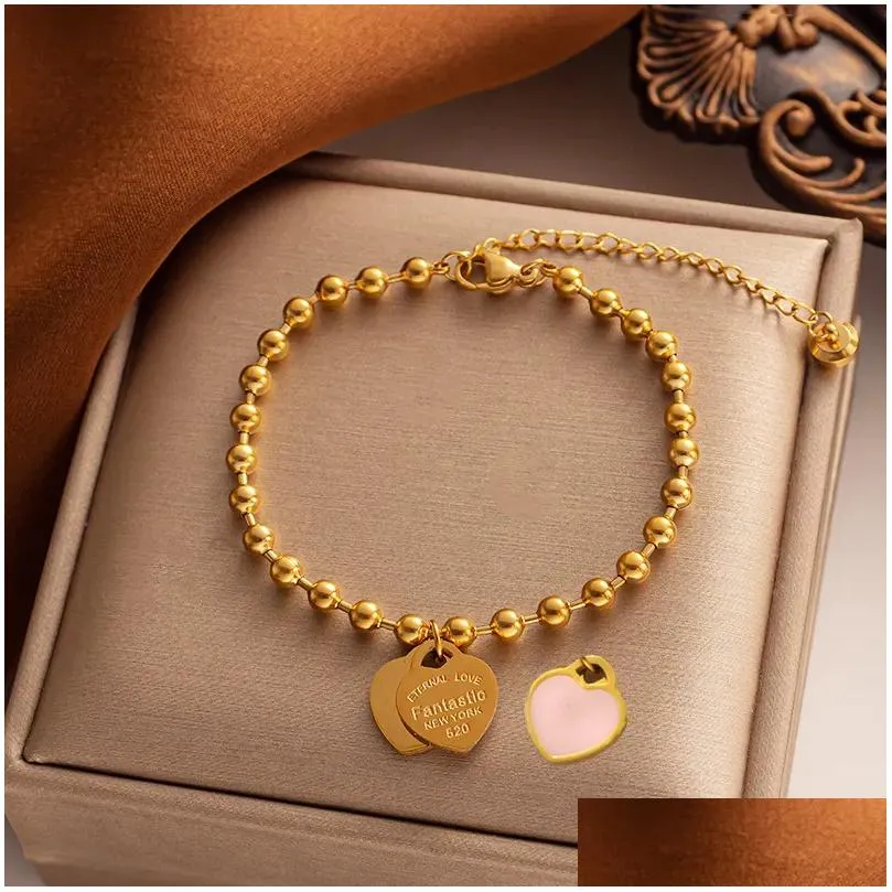 Love enamel pendant Titanium steel plated 18K gold bracelet women`s jewelry Wholesale beads niche design heart-shaped women`s jewelry