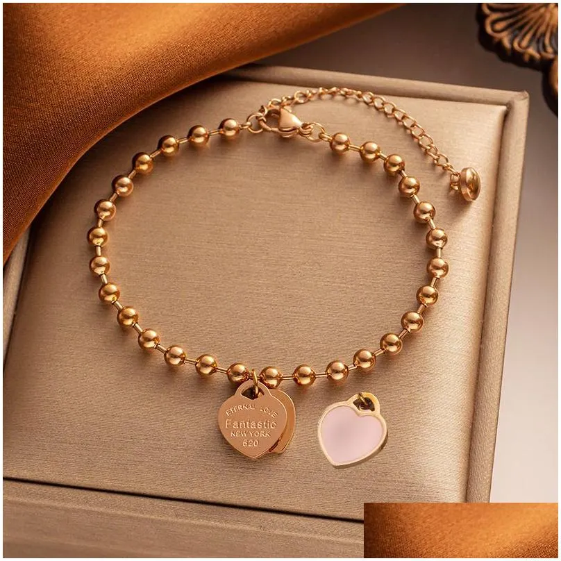 Love enamel pendant Titanium steel plated 18K gold bracelet women`s jewelry Wholesale beads niche design heart-shaped women`s jewelry